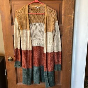 Get ready for Fall! Maurice’s size XS color block knit cardigan.